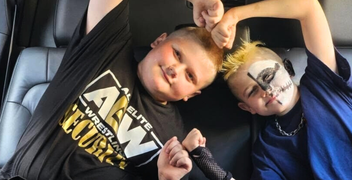 Steven (pictured right) with his friend, seated in the back of a car 
