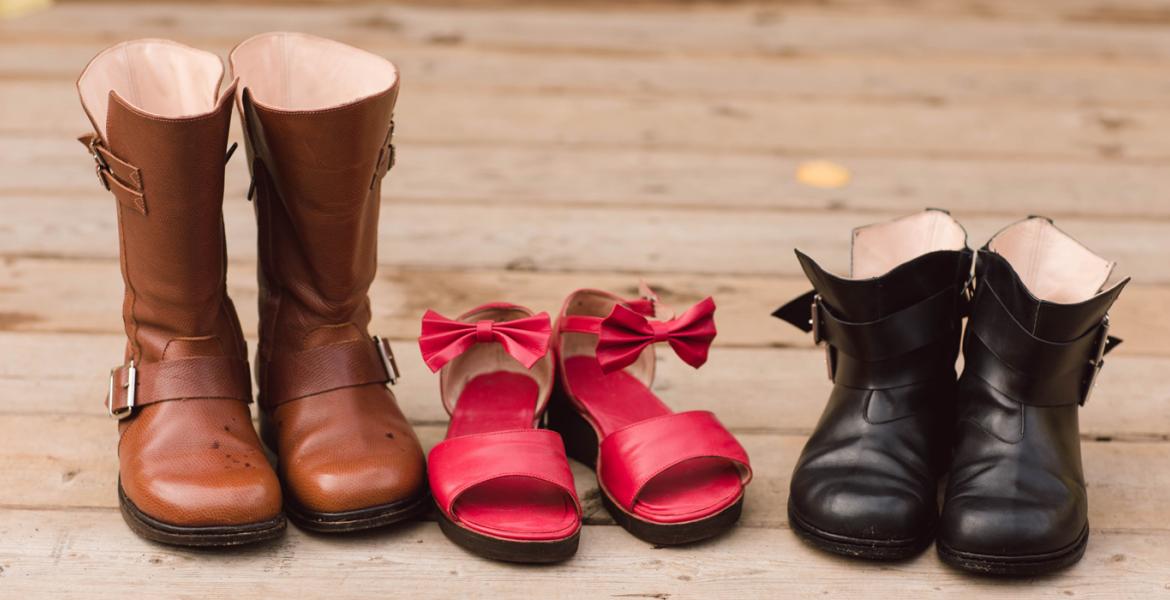 Three pairs of shoes lined up next to each other